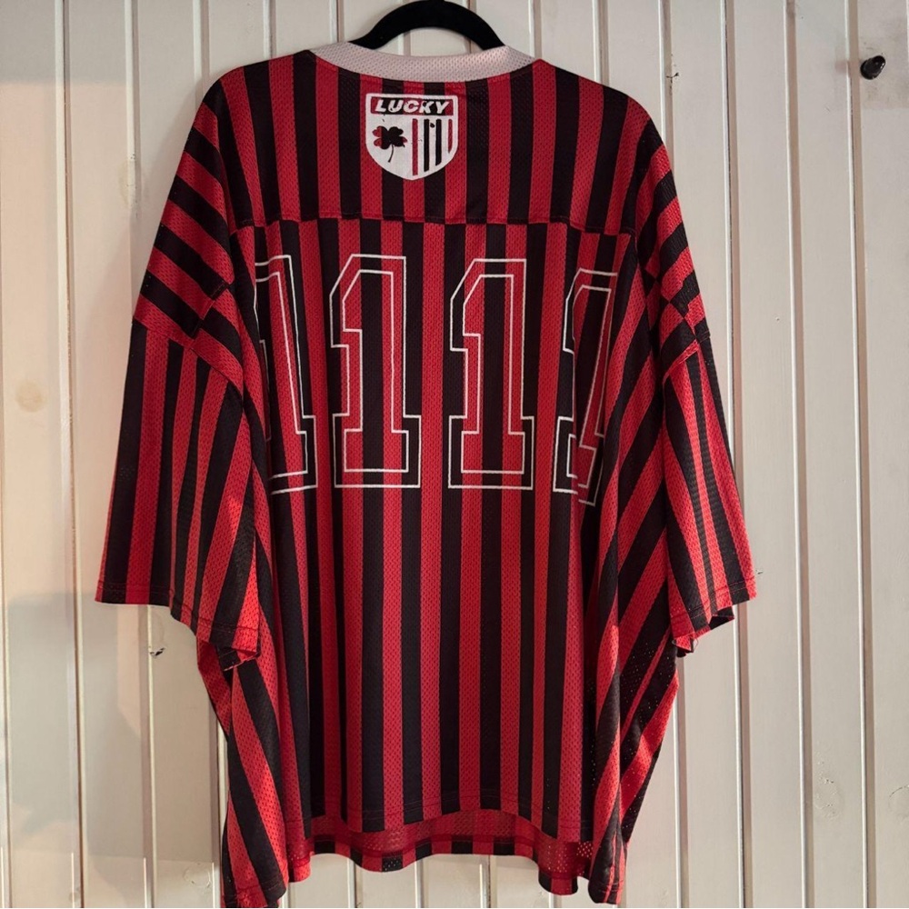 Dressed in Lala Long Live Weirdos Jersey in Red + Black